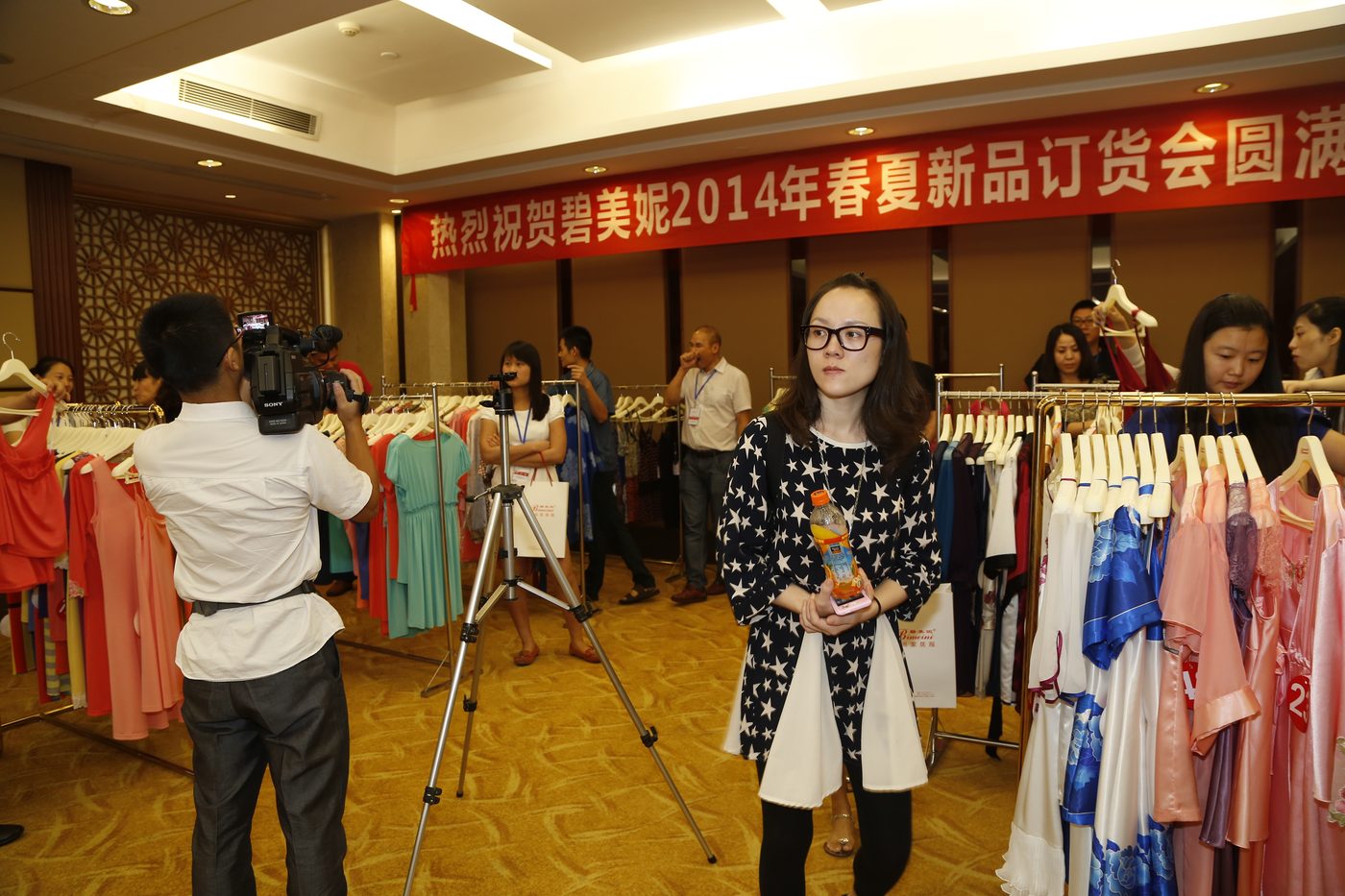 Buyers discussing styles at a Bimeini ordering event